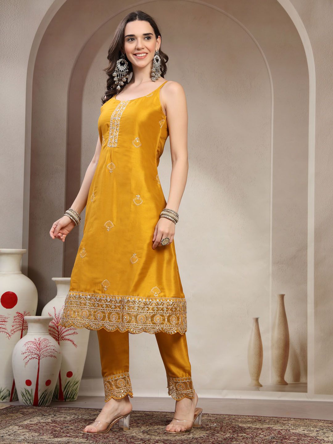 Women Mustard Color Floral Embroidered Sleeveless A-Line Kurta With Trouser Set